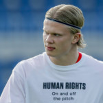 Norway's Erling Haaland, right, wears a t-shirt bearing the message "Human rights on and off the pitch" during the warm up ahead of the World Cup 2022 group G qualifying soccer match between Norway and Turkey at La Rosaleda stadium in Malaga, Spain, Saturday, March 27, 2021. (AP Photo/Fermin Rodriguez)